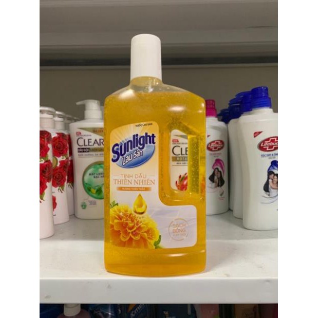 Nước lau sàn Sunlight chai 1kg có 3 mầu như hình