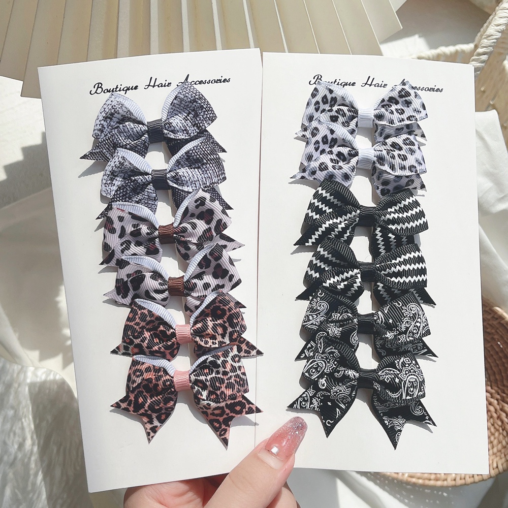 Kẹp tóc KIDSBOWS đính nơ họa tiết da báo dễ thương cho bé gái 2.4&quot;