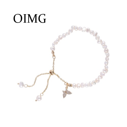 OIMG  Vòng tay ngọc trai nước ngọt hình con bướm khảm zircon