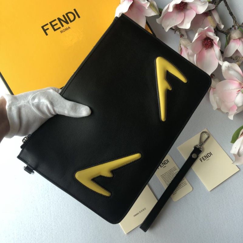 clutch cầm tay nam da thật dáng dài kéo khóa có quai cầm tay họa tiết hình đôi mắt màu vàng Fendi FD