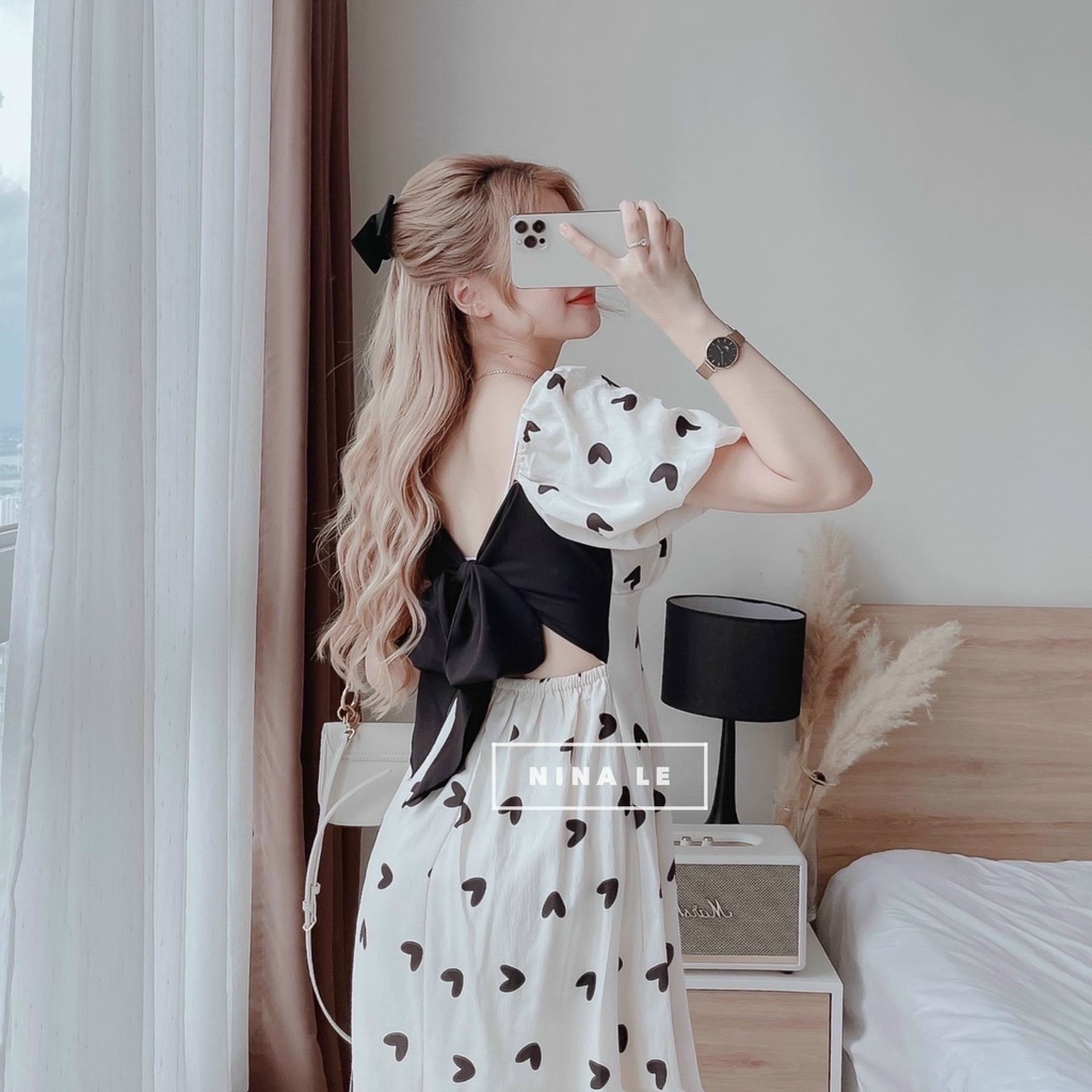 Đầm váy nữ nhún ngực tay phồng phối nơ sau siêu xinh với họa tiết trái tim dành cho các nàng đi chơi, dự tiệc