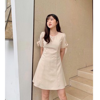Đầm thắt nơ tay cổ tròn