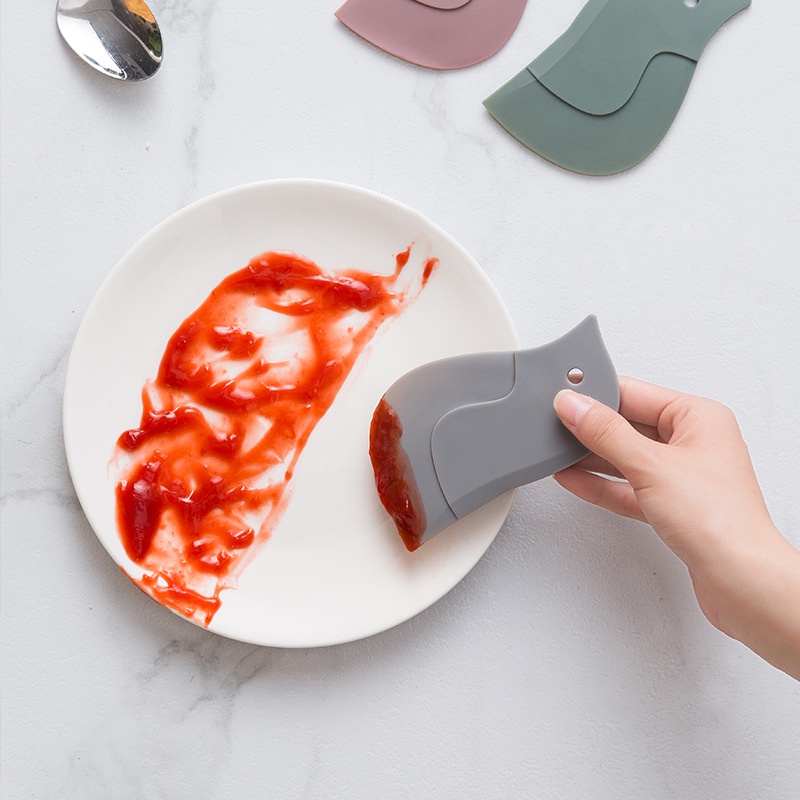 Dụng cụ gạt dầu hình chim cánh cụt sáng tạo