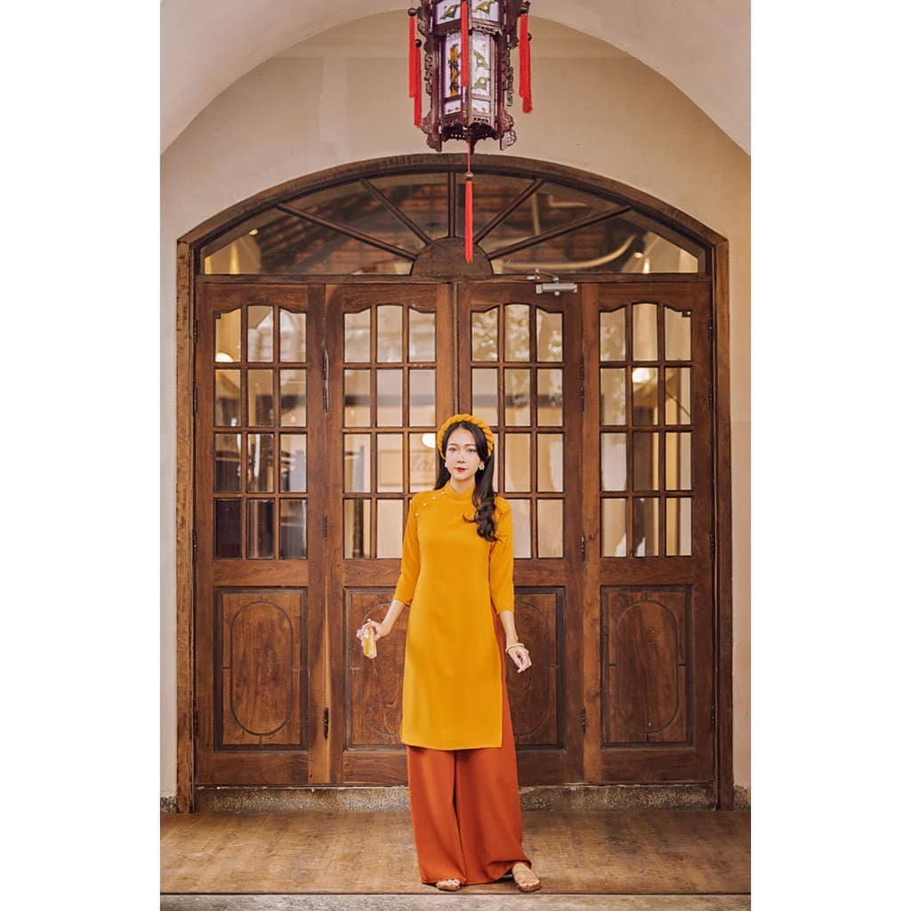 Áo Dài Cách Tân Trơn Dáng Xuông vải Đũi mặc mát thấm hút mồ hôi tốt.