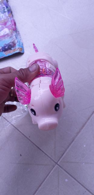 Chú Heo đi dạo bằng nhựa có nhạc và đèn Led rất đẹp tặng kèm PIN