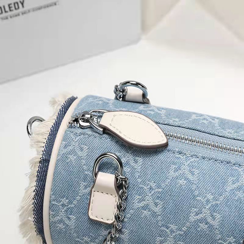 Túi Đeo Chéo Hình Trụ Chất Liệu Canvas Phối Dây Xích Thời Trang Mùa Hè Mới Cho Nữ