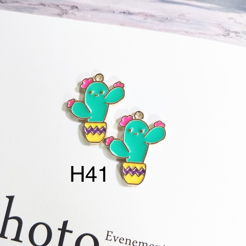 Charm kim loại hình cây xương rồng