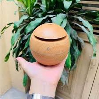 Máy khuất tán xông tinh dầu gỗ tròn