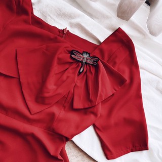 bán sỉ váy đỏ nơ lệch