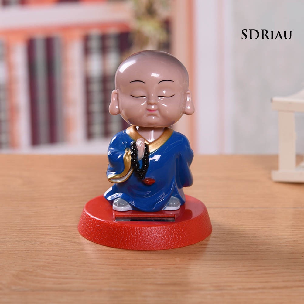 Đồ Chơi Tượng Chú Tiểu Hoạt Hình Sử Dụng Năng Lượng Mặt Trời