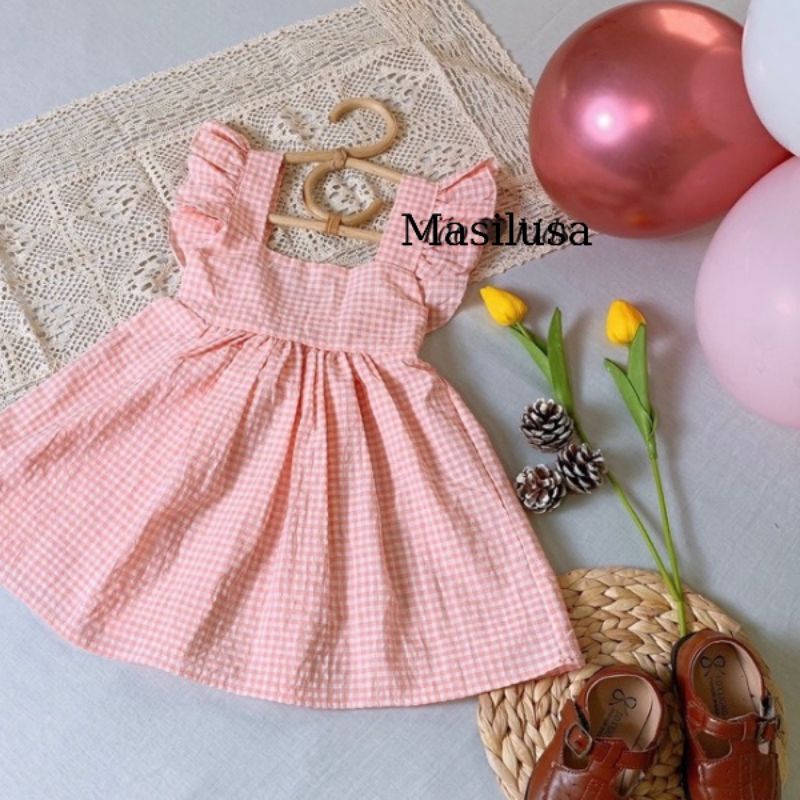 Đầm caro bé gái hai dây hở lưng