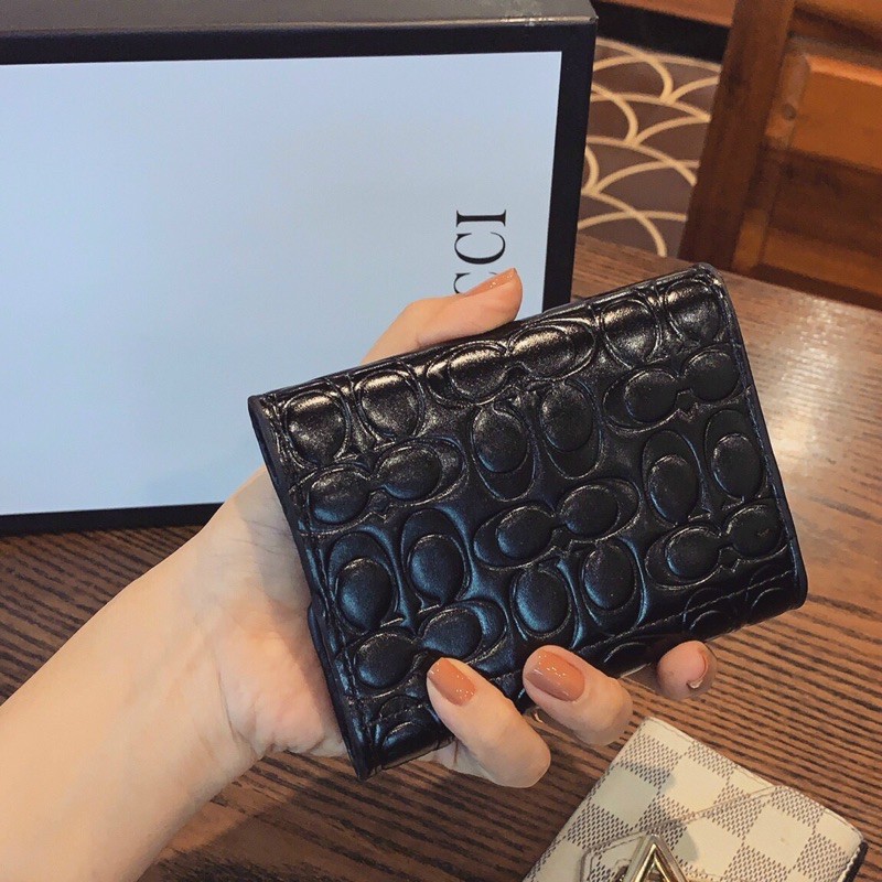 Ví COACH cầm tay