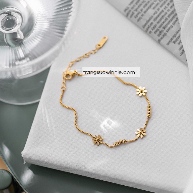 Lắc chân nữ titan hoa bi VG
