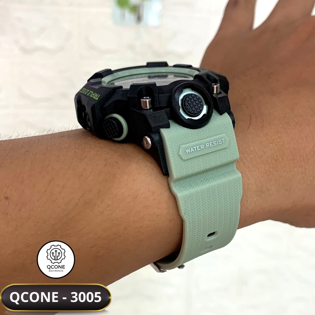 Đồng hồ điện tử trẻ em bé trai và bé gái chống nước Qcone 3005 chống nước 30m đa chức năng có đèn led 7 màu