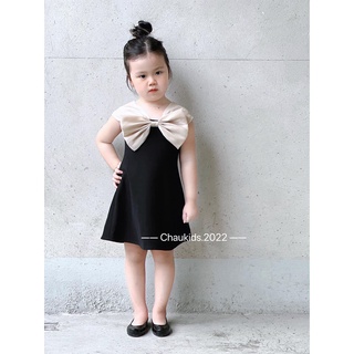 Cặp váy đen nơ bản to bé gái