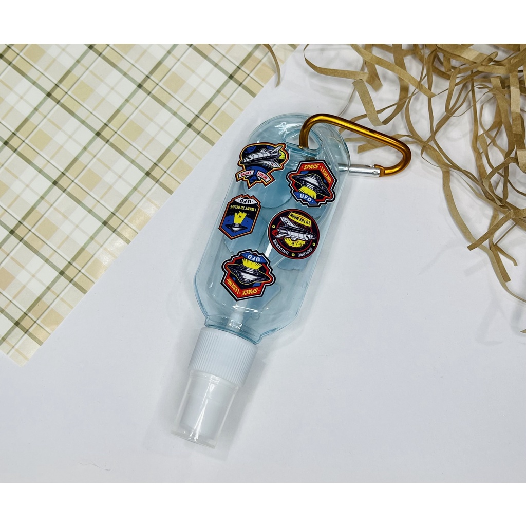 Bình xịt bầu dục 50ml tặng kèm sticker Nasa và móc treo tiện dụng