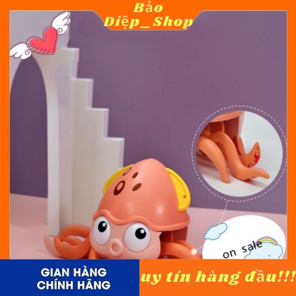 Bạch tuộc vặn cót cho bé,có dây đeo để bé dắt đi dạo và thả vào trong bồn tắm của trẻ kích thước 13x25x11 cm