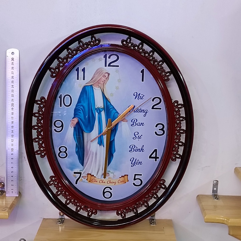 Đồng hồ treo tường oval có in hình size 45x35 đồng hồ trang trí quà tặng công giáo