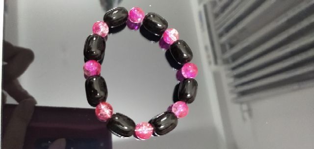 Chuỗi đá tuyết hồng mix đá đen. Mẫu mới
