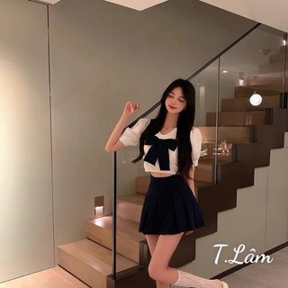 Set áo nơ đính ngực mix chân váy xếp ly đen