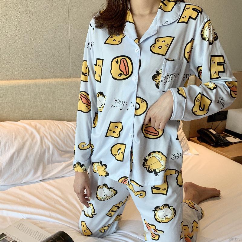 Set đồ ngủ gồm áo tay dài và quần dài in họa tiết hoạt hình phong cách Hàn Quốc xinh xắn cho nữ