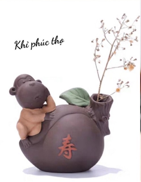 Tượng chú khỉ phúc thọ màu hồng đất nung