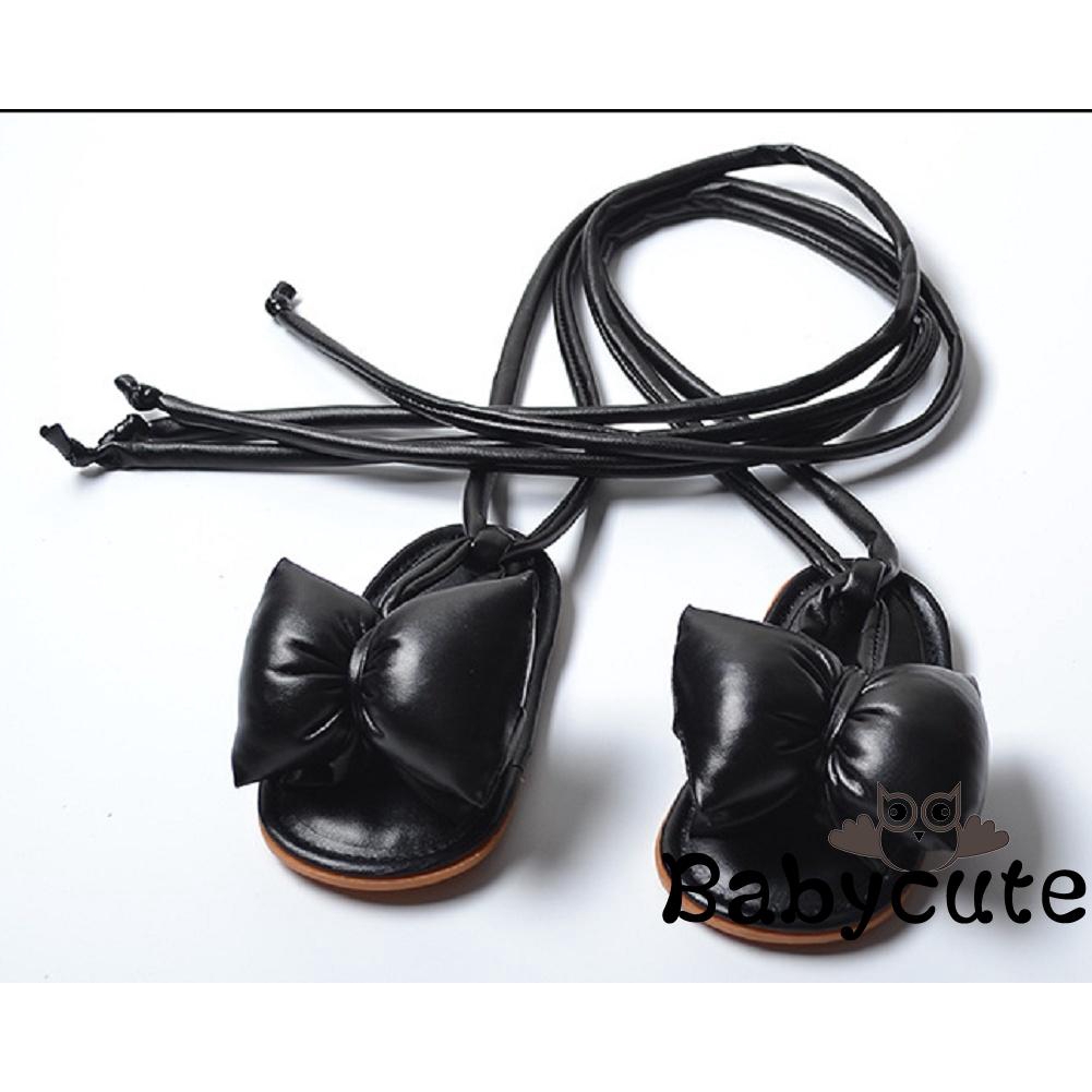 Giày sandals đính nơ cột dây đáng yêu cho bé