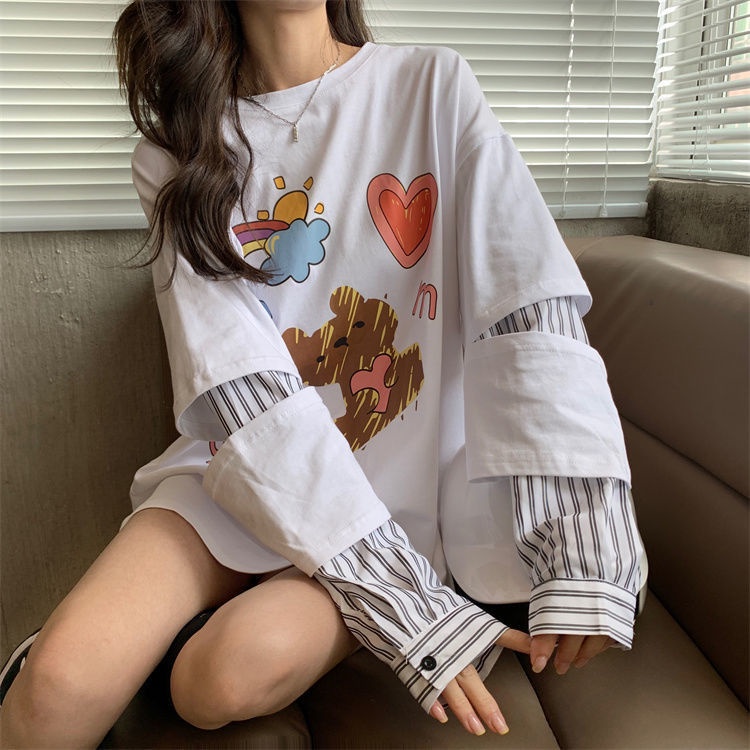 Áo thun tay dài giả hai lớp dáng rộng họa tiết kẻ sọc phong cách Hàn Quốc thời trang mới cho nữ