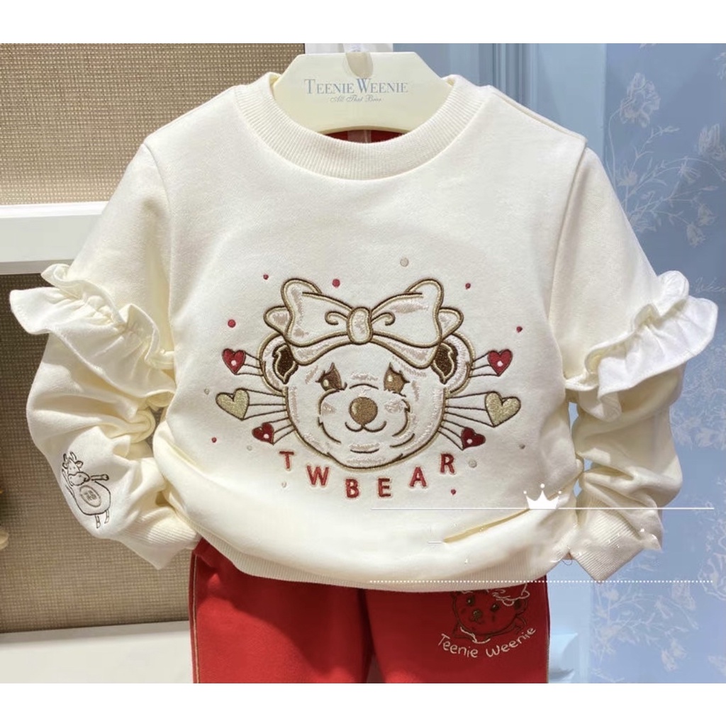 Áo nỉ da cá Teenie Weenie màu kem hình gấu đeo nơ size 105 - 150