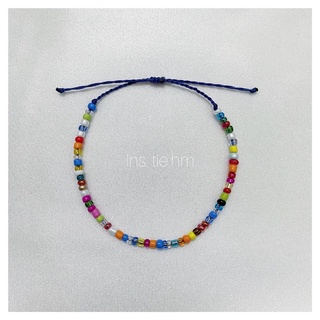 Vòng tay hanmade hạt cườm rainbow