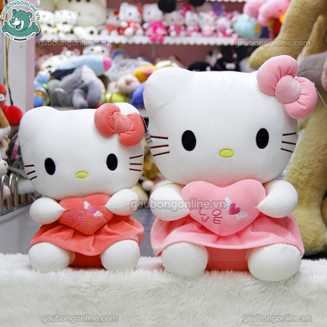 Gấu bông Kitty thiên thần ôm tim mềm màu hồng, cam nhạt kích thước 65cm