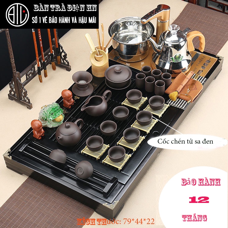 Bàn trà điện thông minh đầy đủ phụ kiện gồm khay bàn đen bằng gỗ tự nhiên, bếp đun nước tự động bằng inox cốc chén