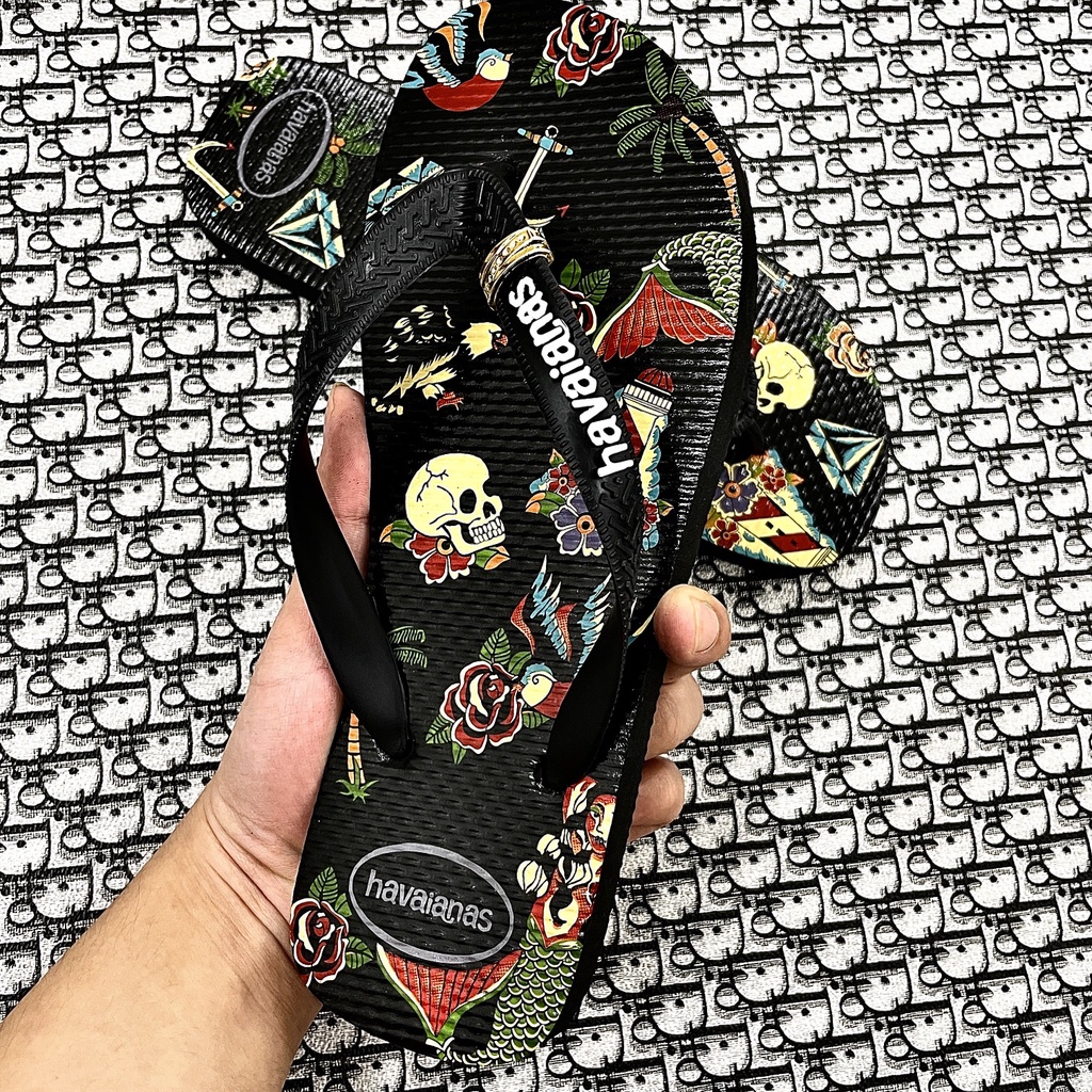 Dép xỏ ngón nam Havanas hoạ tiết đầu lâu in 3D, phù hợp đi biển bền bỉ êm chân thời trang cá tính.