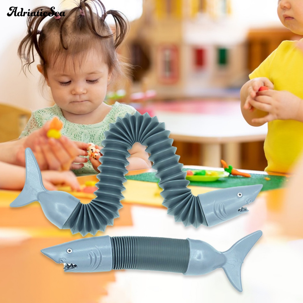 Đồ Chơi Con Quay Hình Cá Mập Ống Co Giãn DIY