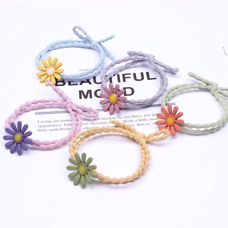 Thun cột tóc hoa cúc dễ thương
