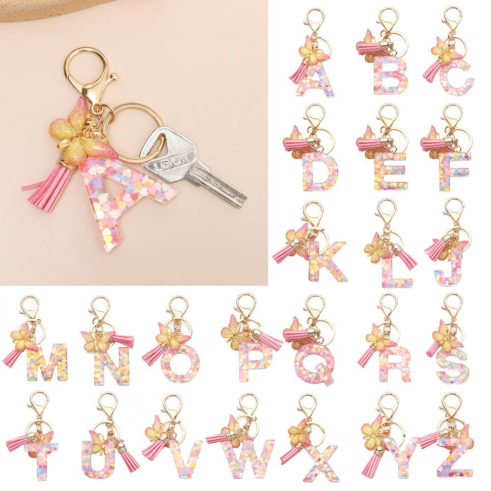 Móc Khóa Mặt Nhựa Resin In Chữ Phối Tua Rua Độc Đáo Thời Trang