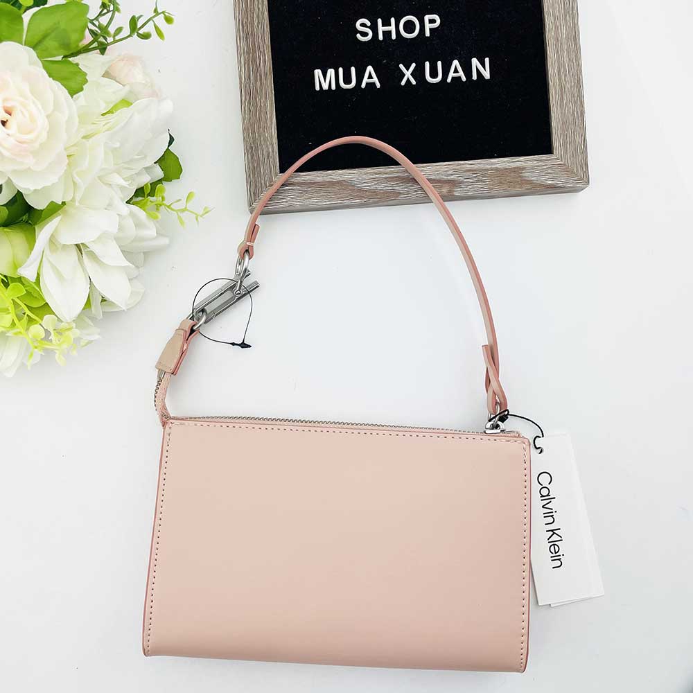 Túi đeo vai nữ Calvin Klein Embossed Logo Convertible Pouch, Pink