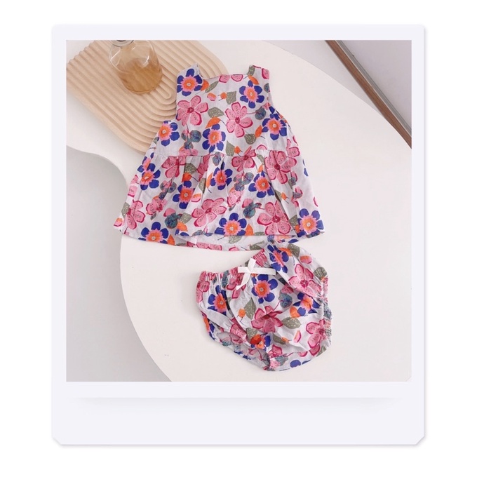 Bộ váy chip  hoạ tiết hoa vàng tím bé gái(8-18kg)