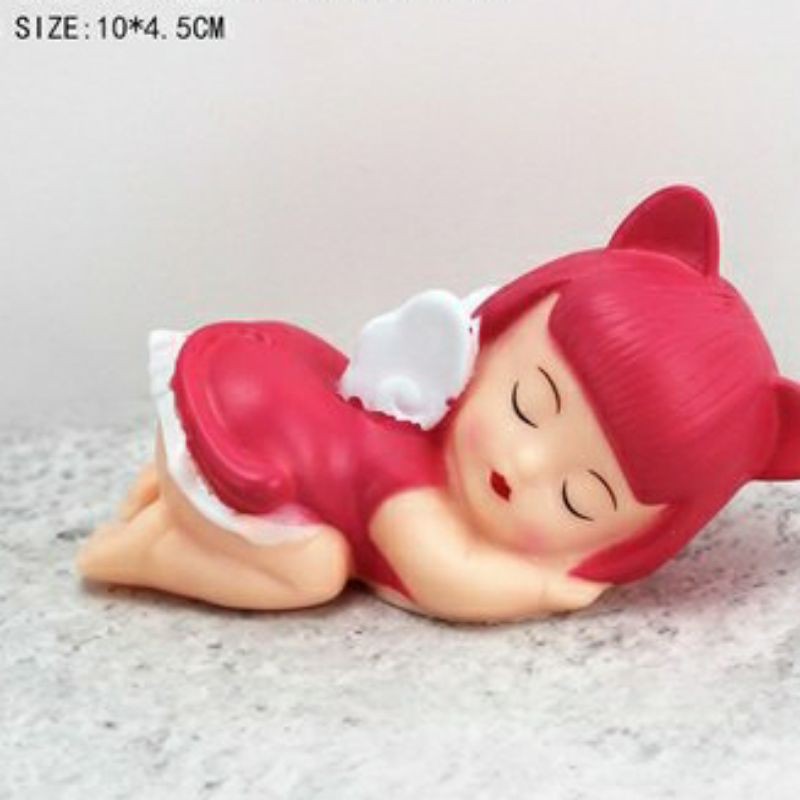 Bé trai/gái nằm ngủ trang trí bánh