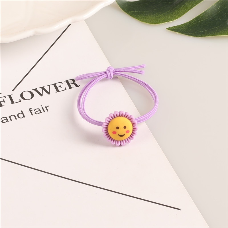 Dây buộc tóc hoa mặt cười xinh xắn  Clovershop68