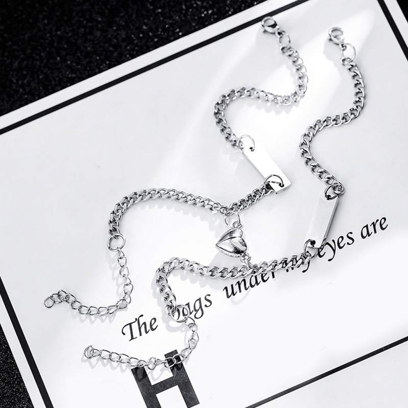 Set 2 Vòng Tay Mặt Hình Trái Tim Bằng Thép Titan Có Nam Châm Cho Cặp Đôi