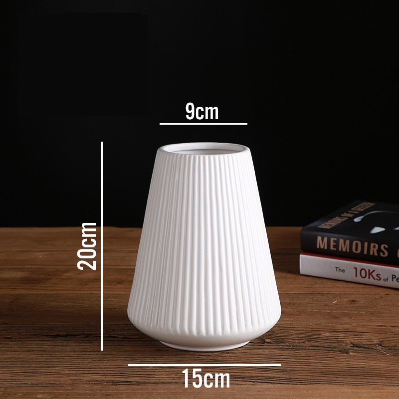 Bình hoa lớn gôm sứ cắm hoa trang trí phòng khách.