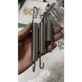 lò xo chống đứng inox