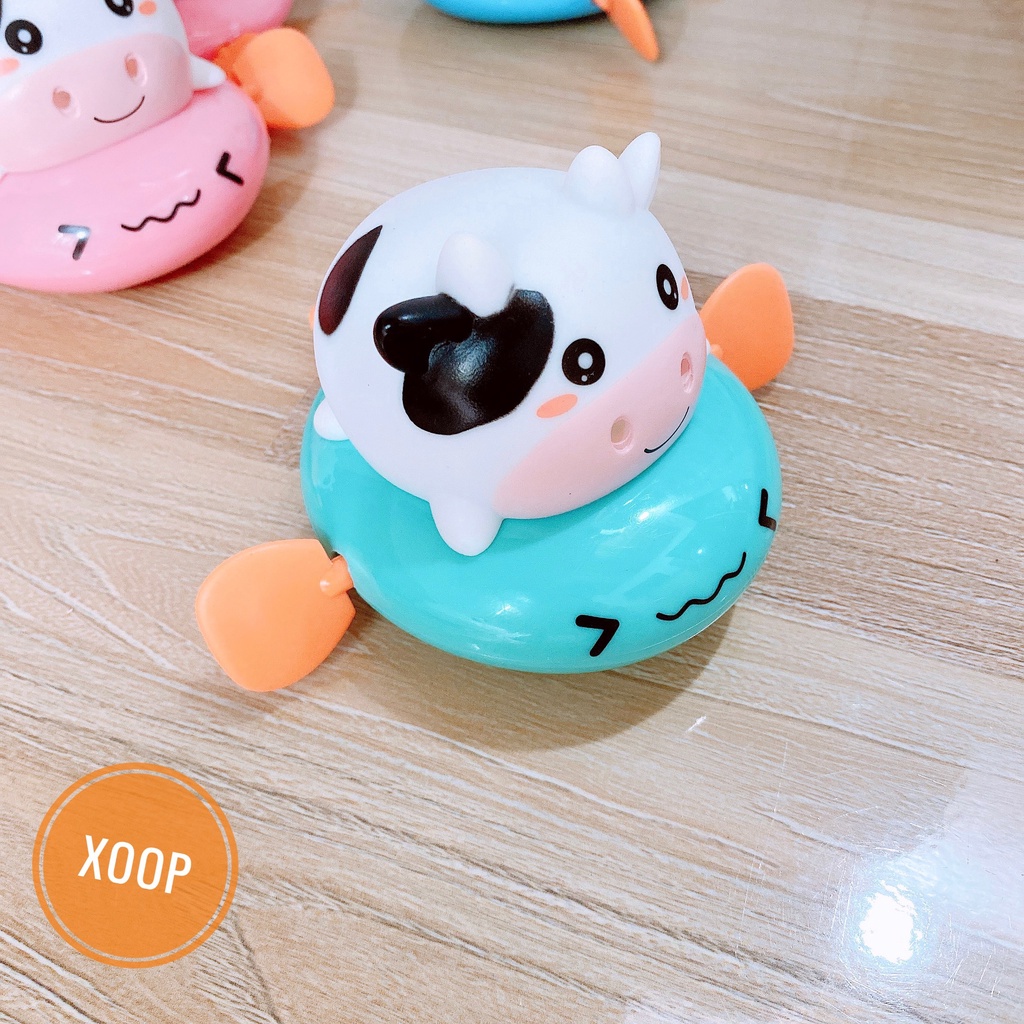 Đồ chơi nhà tắm bò sữa chèo thuyền phun nước vặn cót ngộ nghĩnh đáng yêu cho bé