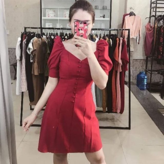 Đầm tay phồng nút bọc