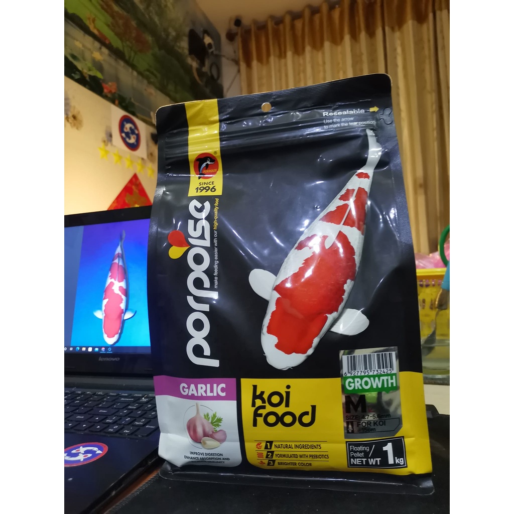 Cám Porpoise Growth cao cấp tăng trưởng cho cá Koi(có tỏi giúp cá tiêu hóa tốtvà  tăng để kháng)gói 1kg,thức ăn cá Koi