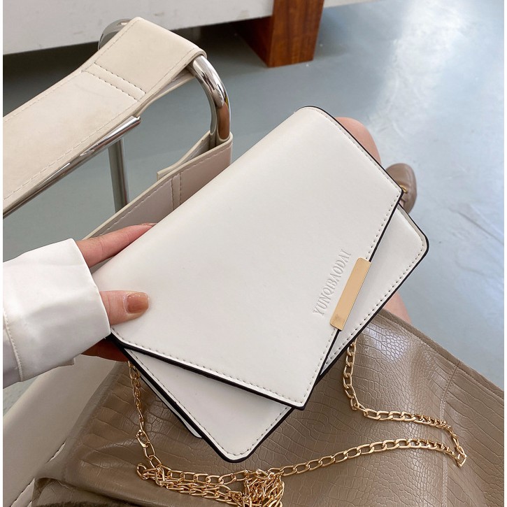 [Mã WAMT2405 giảm 10K đơn 0K] TÚI XÁCH NỮ ĐEO CHÉO DA PU TRƠN MỀM NẮP BÌ THƯ LỆCH NẸP ĐỒNG YUNO TD 142 | BigBuy360 - bigbuy360.vn