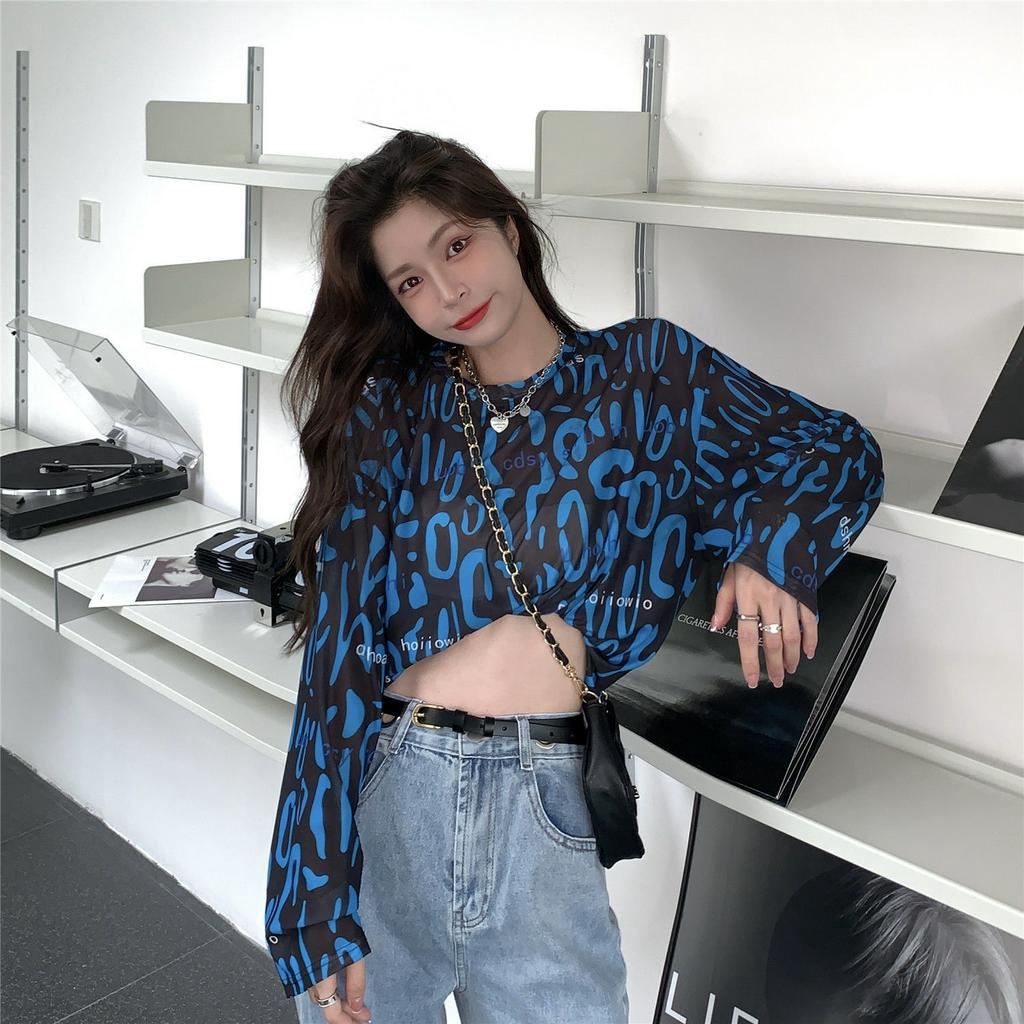 Áo thun tay dài dáng rộng họa tiết da báo cá tính cho nữ