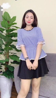 Áo sơ mi kẻ xoè dưới