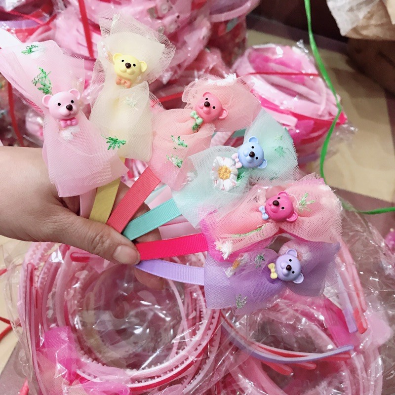 Sỉ 10 cài tóc nơ ren gắn các hoạ tiết hình thú xinh xắn cho các bé